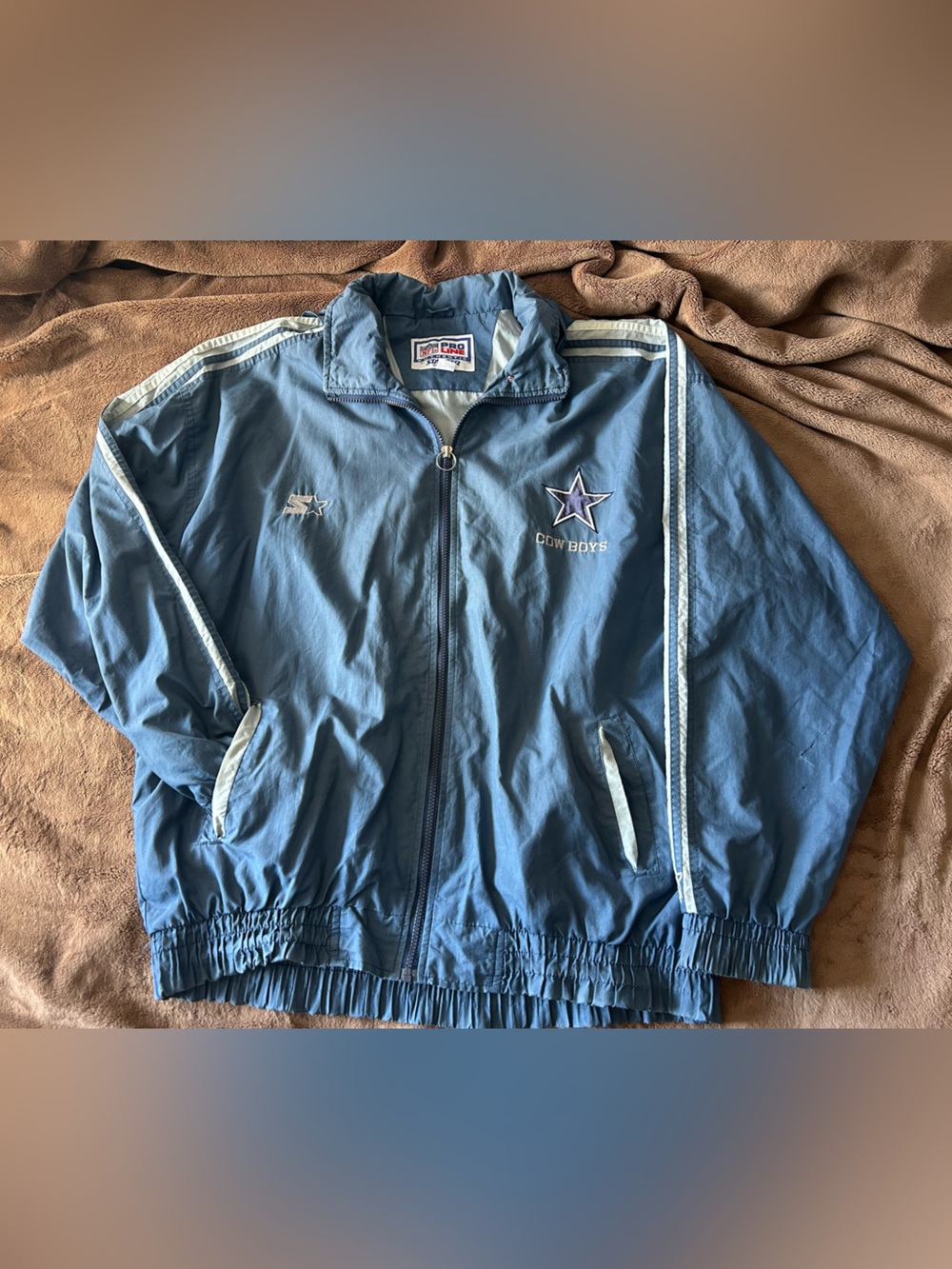 NFL Dallas Cowboys Light Blue Starter Windbreaker with White Trim